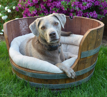 Load image into Gallery viewer, Wine barrel dog bed with dog and flowers 
